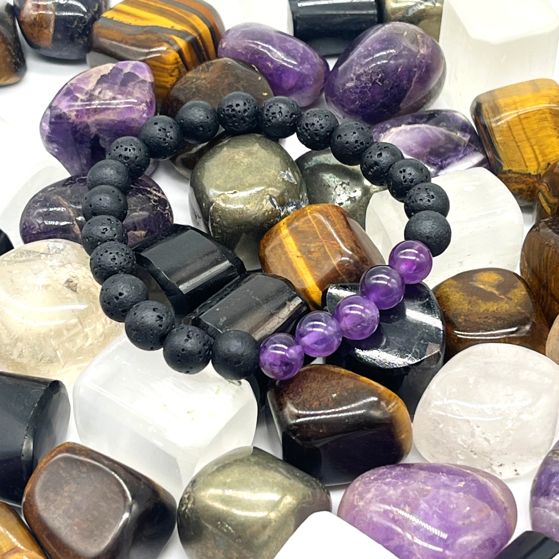 Natural amethyst crystal bracelet with black lava stone beads for meditation