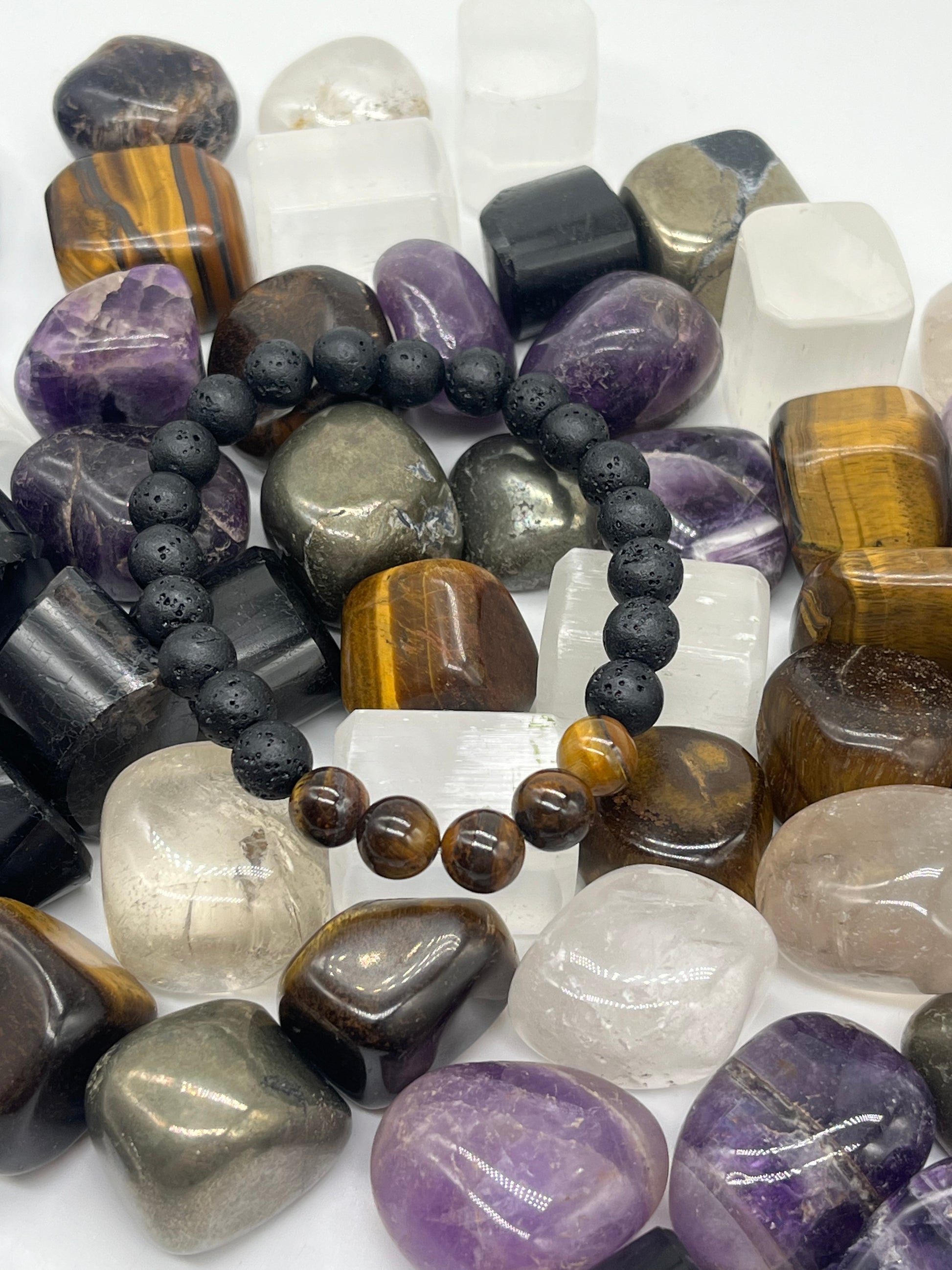 Natural tiger eye and black lava stone healing bracelet for strength and grounding