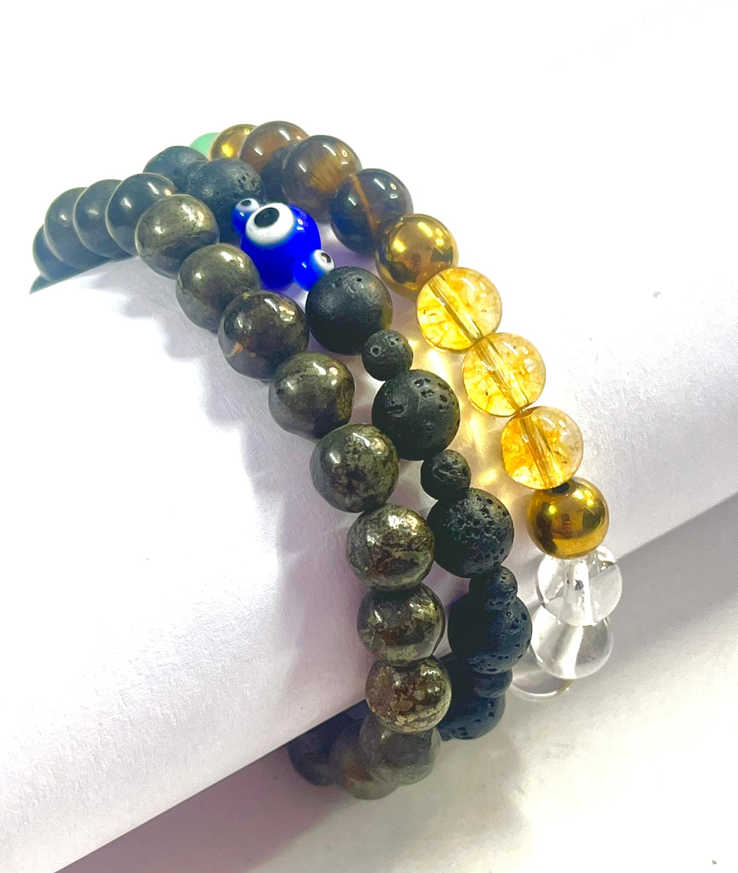 Complete wealth attraction bracelet set with pyrite lava stone and evil eye protection